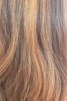 Sunlit Brunette | A rich dimensional caramel brunette with warm golden and copper accents, offering a naturally sun-kissed appearance that adds depth and movement
