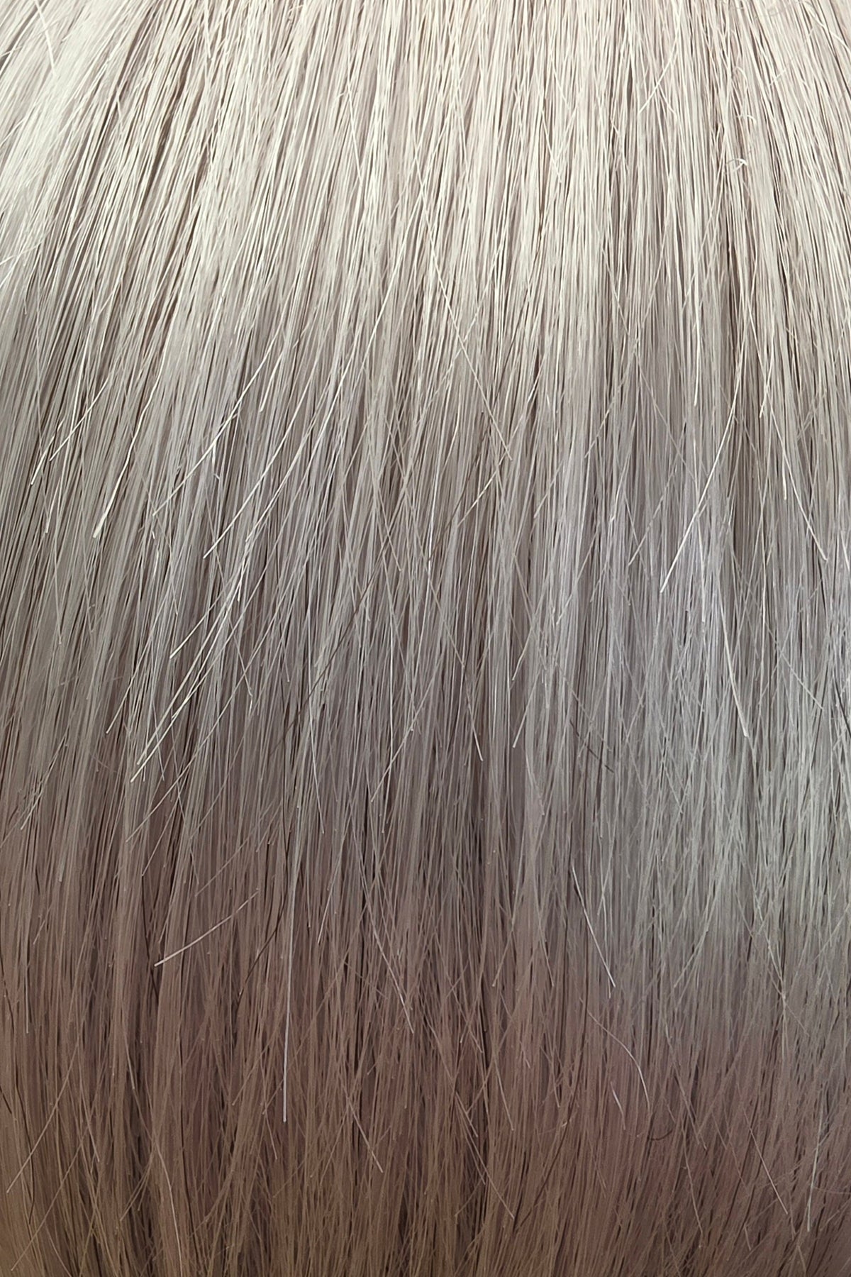 Winter Pearl | A luminous silvery-white blend with soft, cool pearl and icy gray undertones. This sophisticated shade combines delicate variations of white and silver for natural-looking dimension.