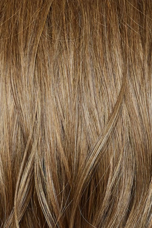 Caramel Biscotti | a beautiful mid/dark blond hair color with delicate caramel blond highlights seamlessly blended throughout, creating a warm and inviting look