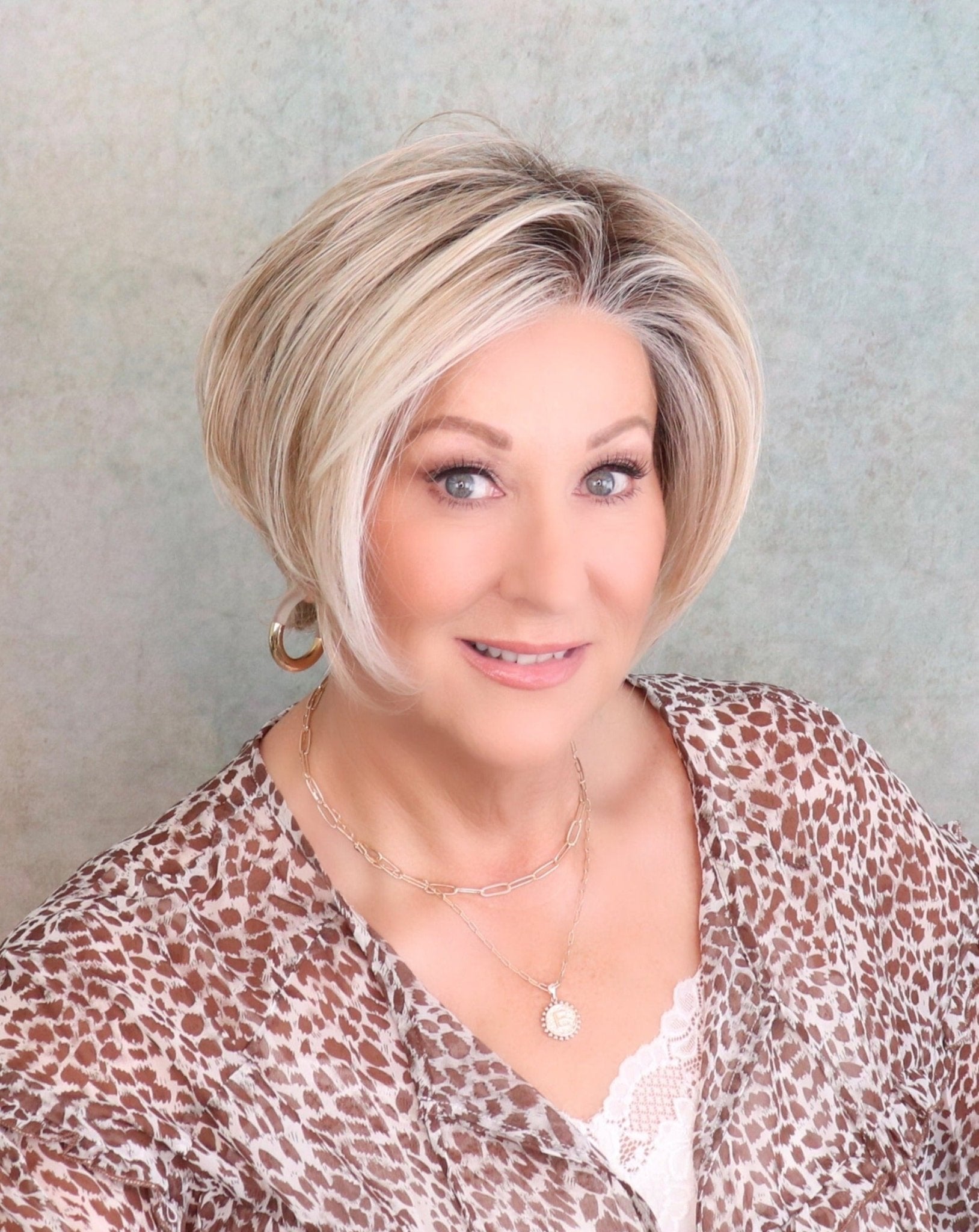 Go to Style by Raquel Welch | HF Synthetic Lace Front Wig | Mono Part - Wig Studio 1