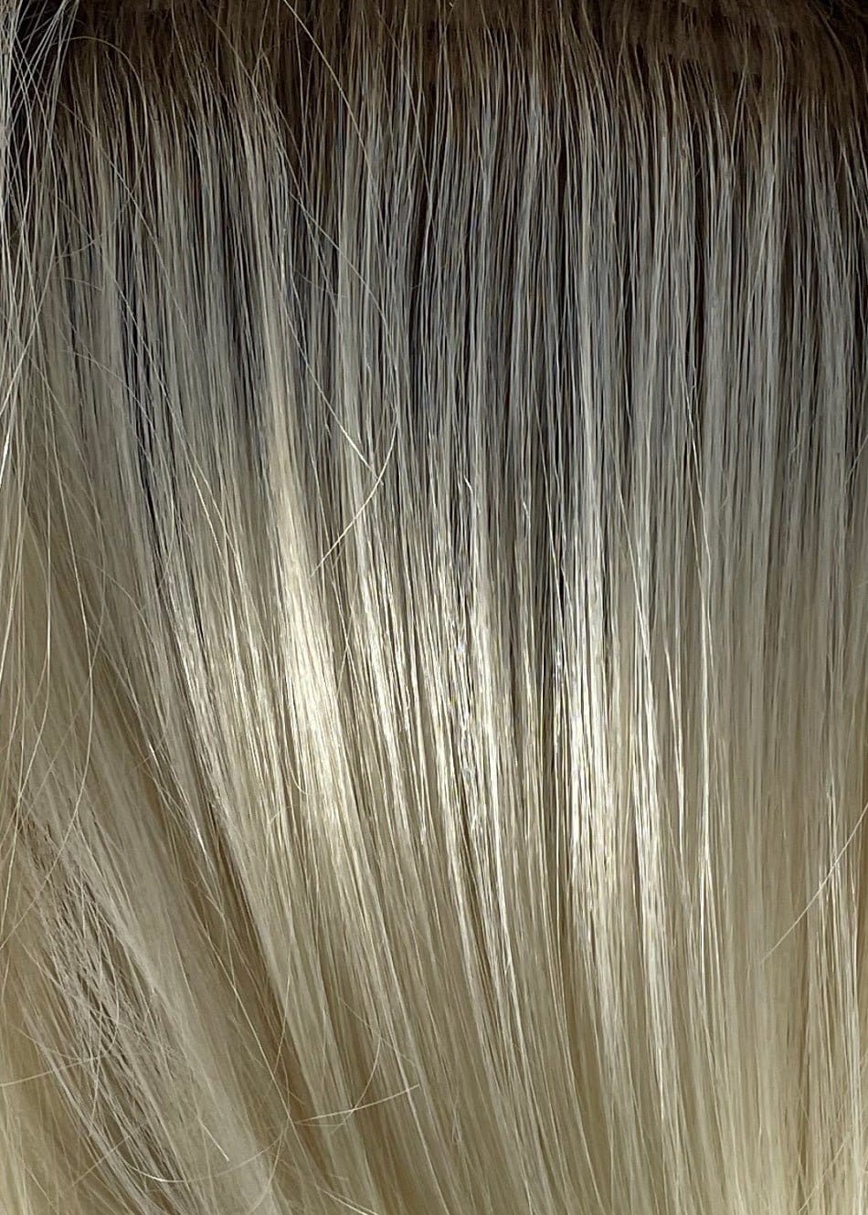 Seashell Blonde R | A mixture of cool white blond and creamy white tones with a soft brown root